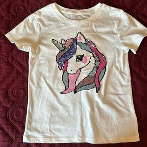 New T-shirt from H&M with tags (bought in the UK), size 6X-7.